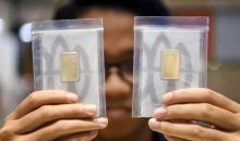  Harga Emas Cetak Sejarah Baru, Tembus 5.000 Dolar AS per Ons