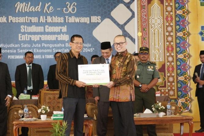  Dompet Dhuafa Terima Wakaf Saham Seribu Lembar dari BAF Syariah